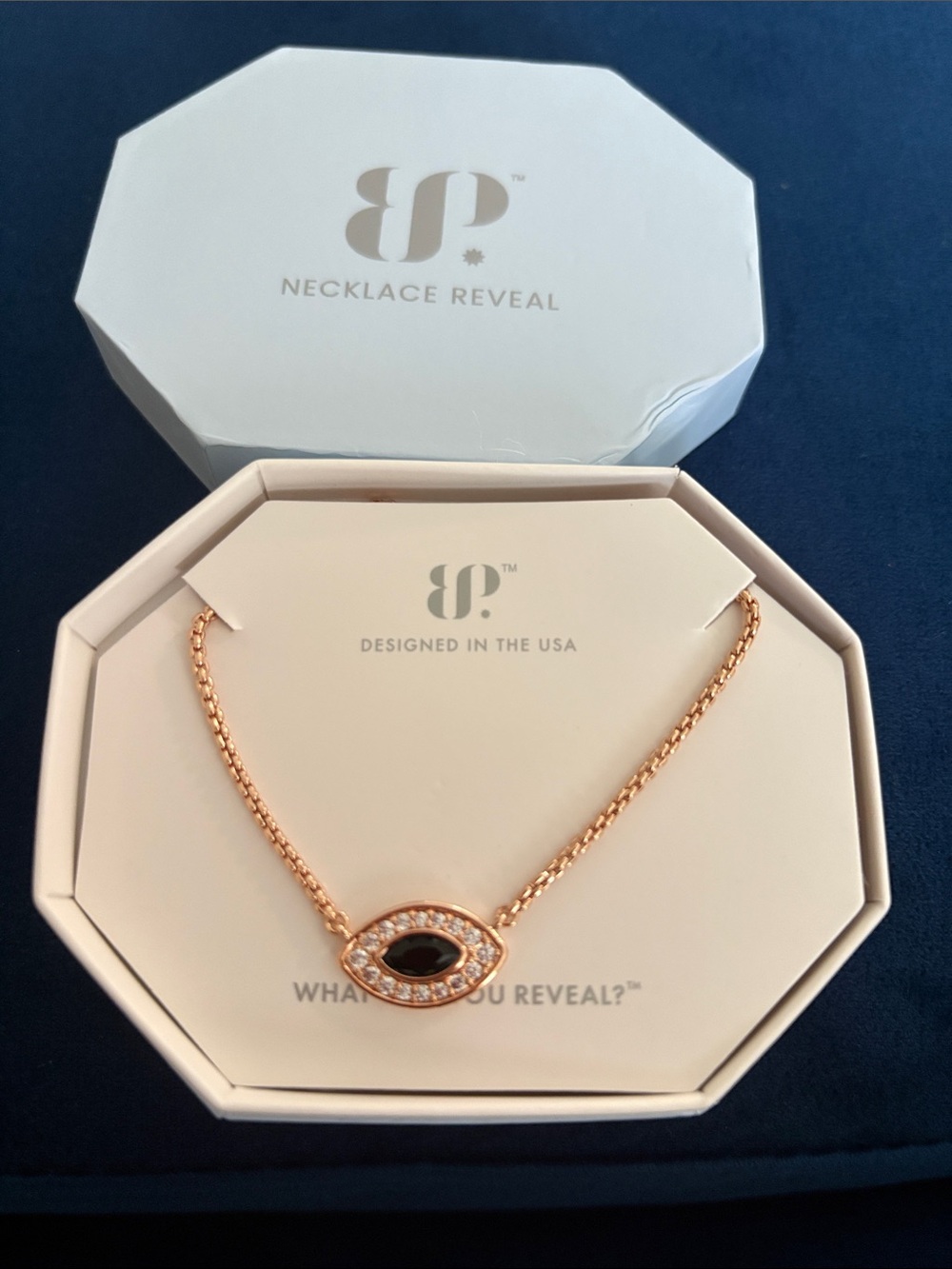 Rose Gold Evil Eye Necklace with Black Center Stone by Necklace Reveal